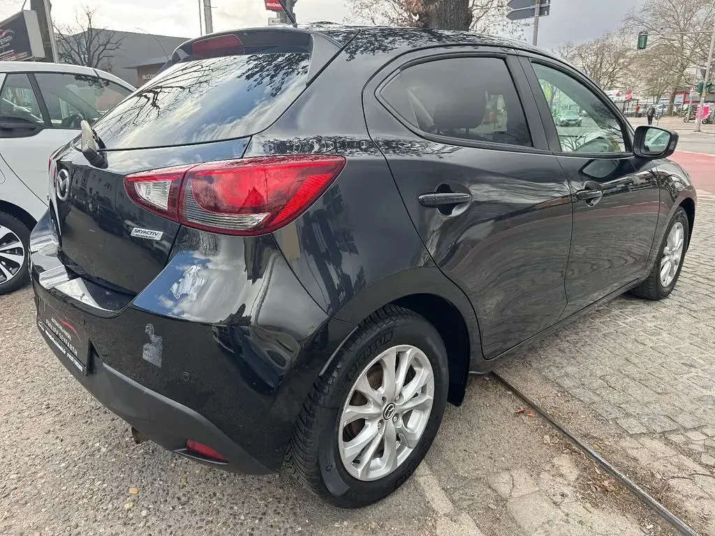 Brugt Mazda 2 Exclusive-Line 90 HK (66 kW) 2016 Sort Sedan