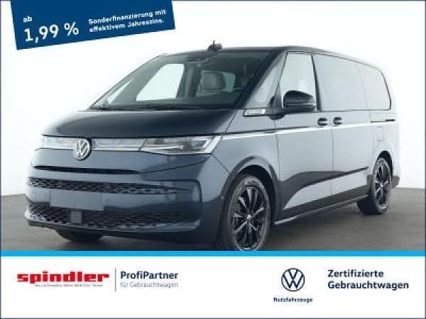 Blau (starlight blue metallic) Gebraucht 2024 VW Multivan Style Van | 63.981 € (Teuer) - Bild 1/3