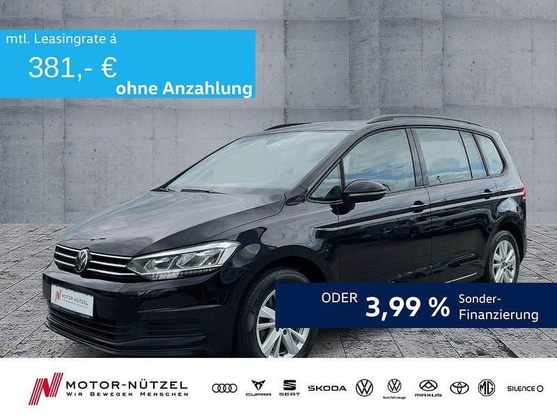 Deep black perleffekt Gebraucht 2021 VW Touran Comfortline Van / Kleinbus | 27.530 € (Fairer Preis) - Bild 1/4