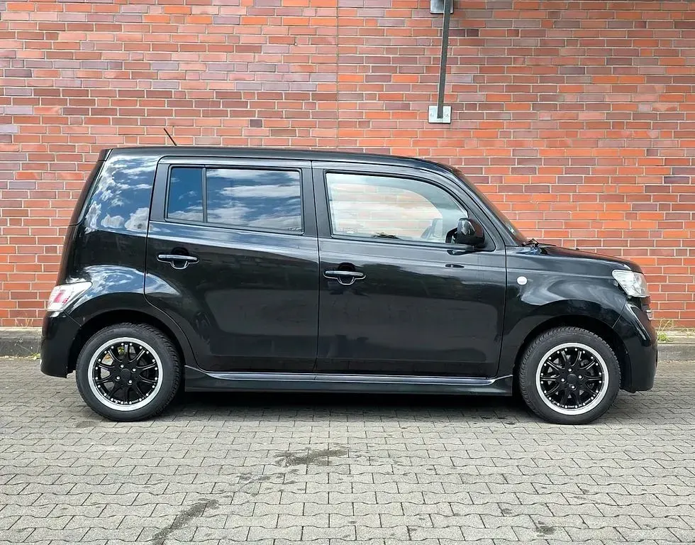 Gebraucht Daihatsu Materia 91 PS (66 kW) 2009 Schwarz Van / Kleinbus