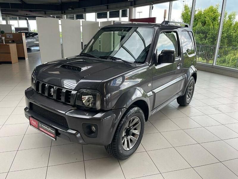 Grau Gebraucht 2017 Suzuki Jimny Style SUV | 18.980 € (Etwas zu teuer) - Bild 1/4