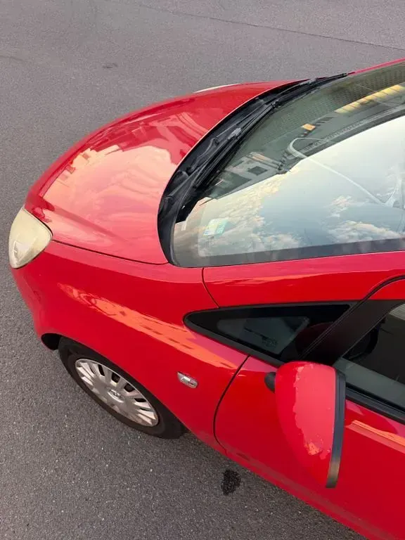 Gebraucht Opel Corsa Edition 80 PS (58 kW) 2009 Rot Kleinwagen