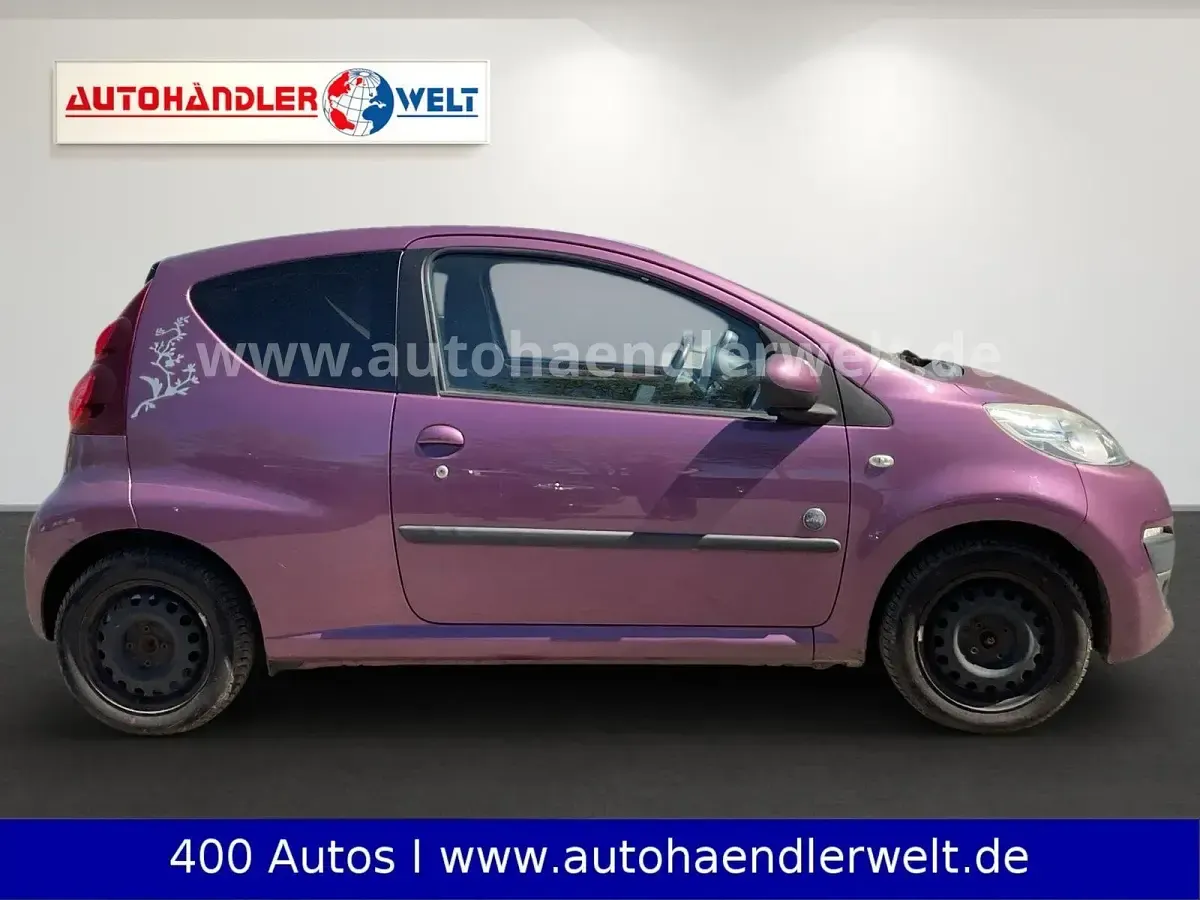 Gebraucht Peugeot 107 Access 68 PS (50 kW) 2012 Violetmetallic Kleinwagen