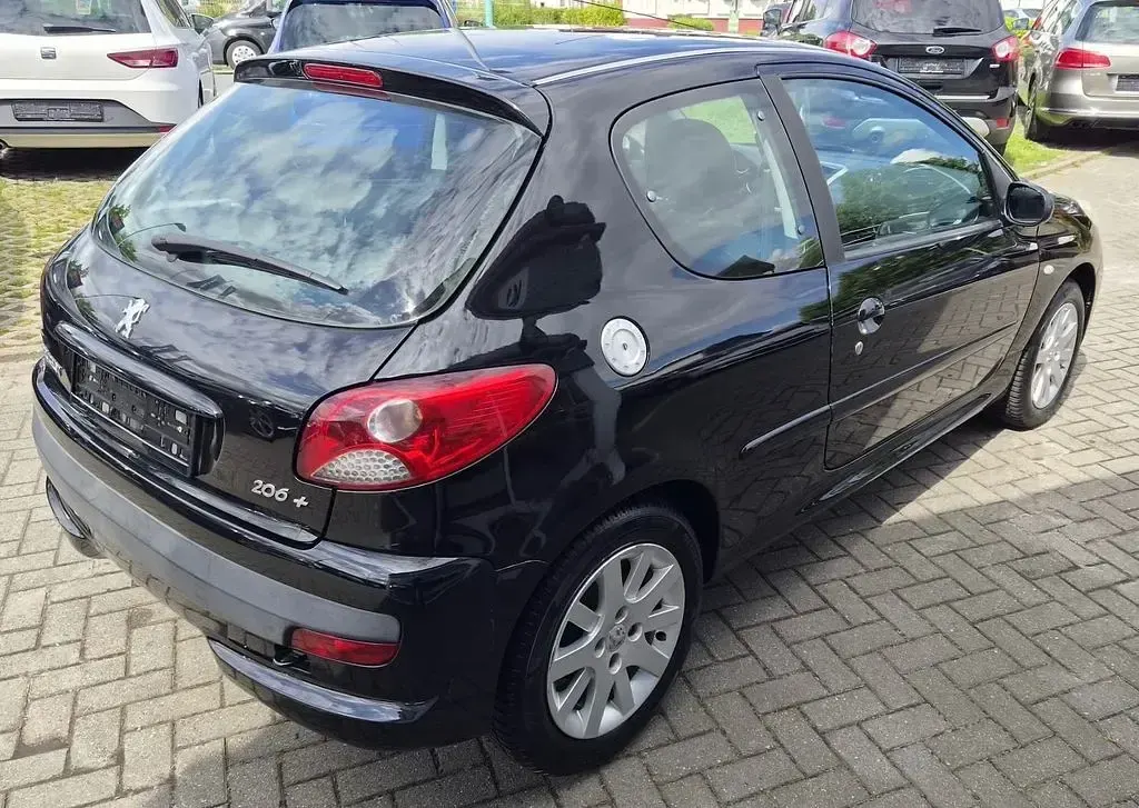 Gebraucht Peugeot 206+ Basis 75 PS (55 kW) 2009 Noir perla nera Kleinwagen