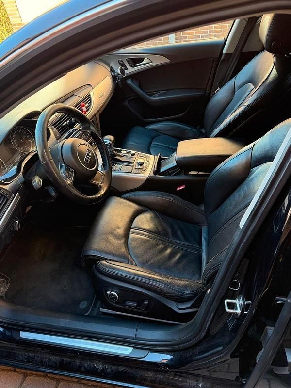 Używany Audi A6 Ambiente 245 KM (180 kW) 2012 Czarny Kombi
