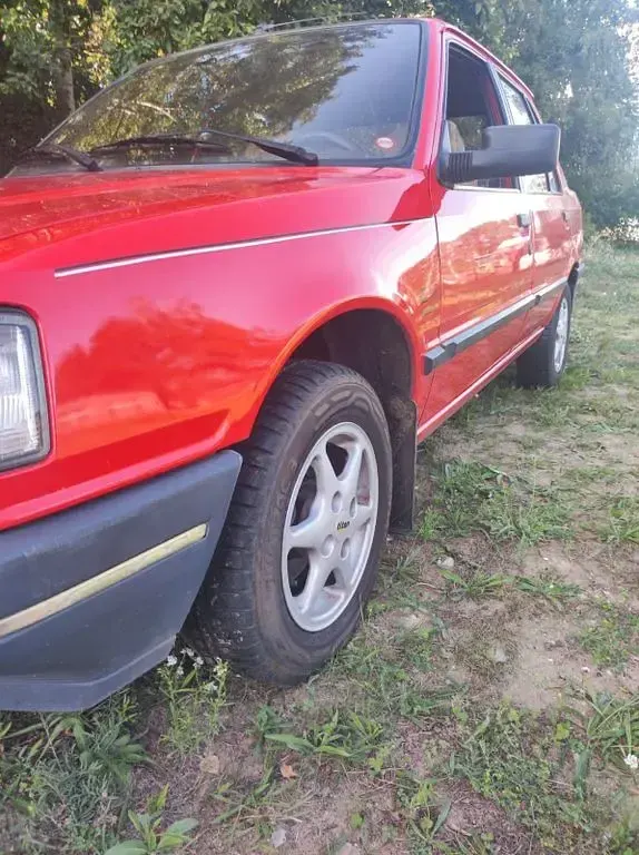 Gebraucht Peugeot 309 88 PS (64 kW) 1991 Rot Kleinwagen