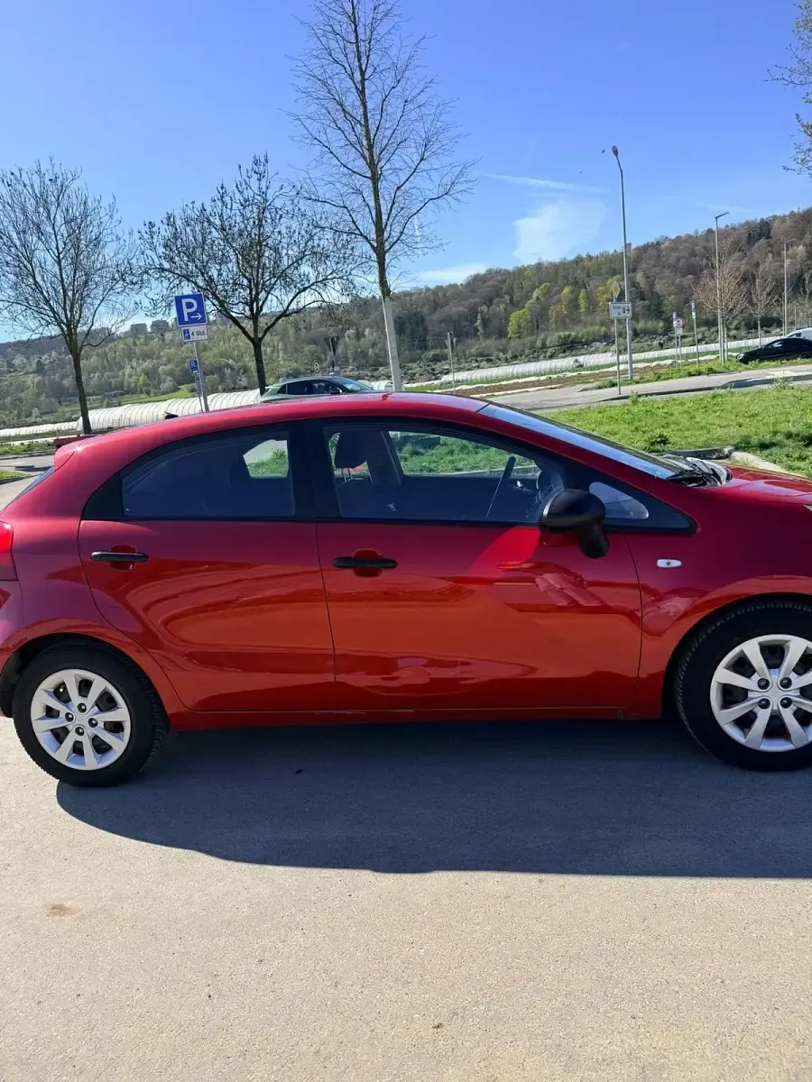 Gebraucht Kia Rio 89 PS (65 kW) 2012 Rot Kleinwagen