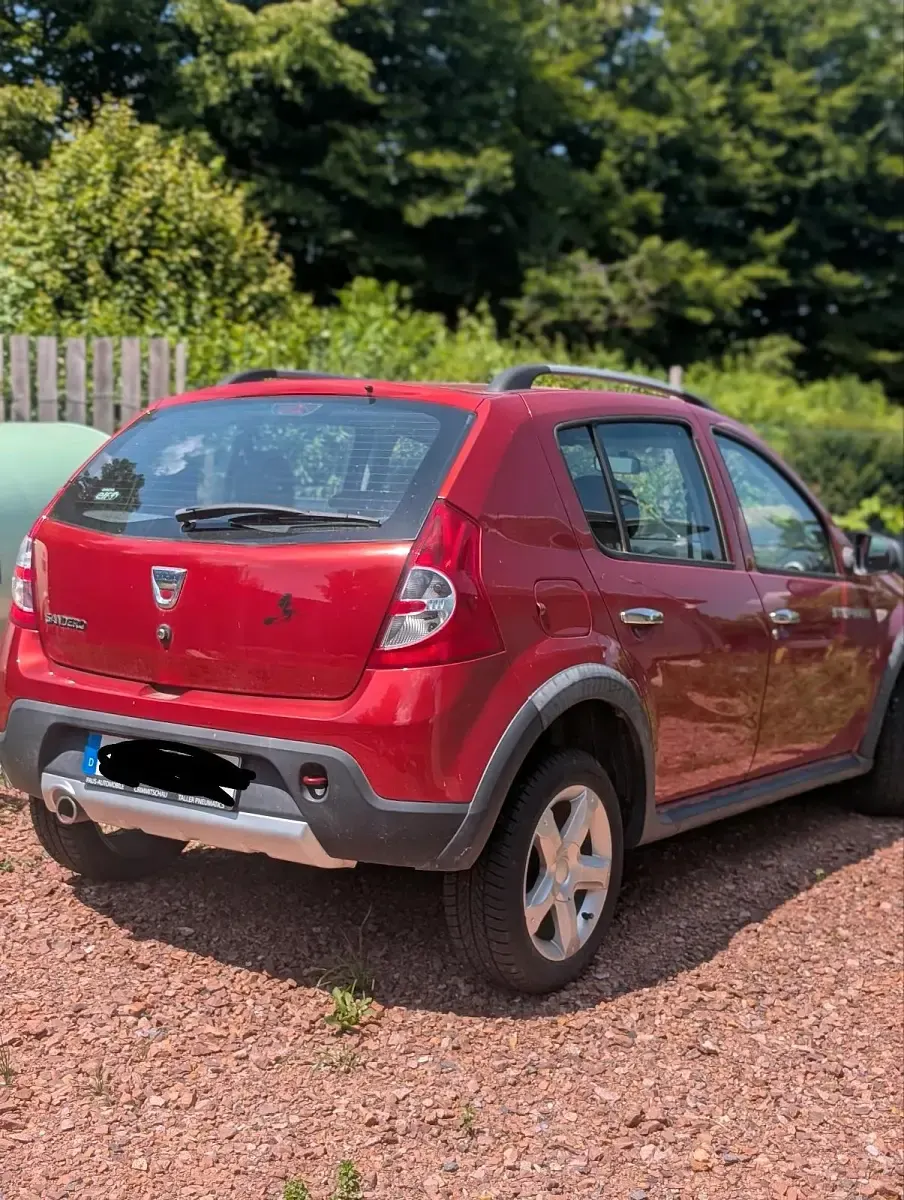 Gebraucht Dacia Sandero Stepway 84 PS (61 kW) 2012 Rot Kleinwagen