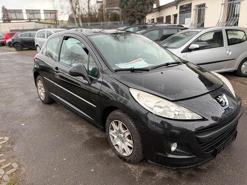 Gebraucht Peugeot 207 73 PS (53 kW) 2011 Schwarz Kleinwagen