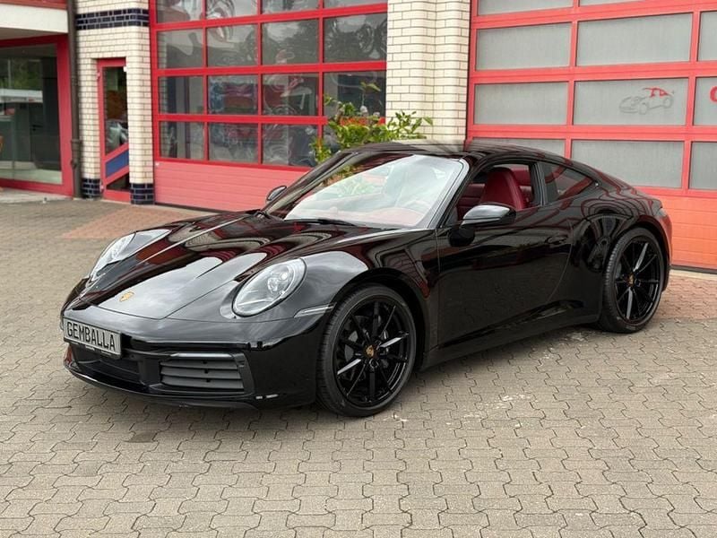 Tiefschwarz Neu 2025 Porsche 911 Carrera 4 Chrono Coupé | 137.500 € (Superpreis) - Bild 1/4