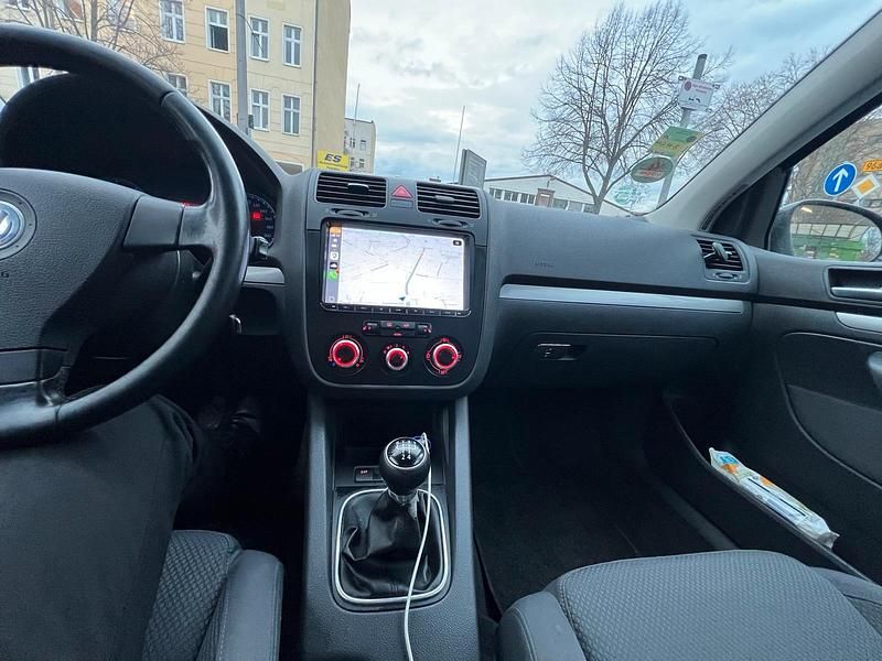 Second-hand VW Golf 75 CP (55 kW) 2005 Negru Coupe