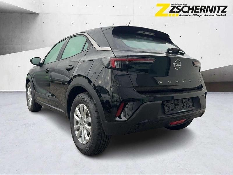 Gebraucht Opel Mokka-e Edition 100 kW (136 PS) 2023 Lackierung schwarz perla nera/ SUV