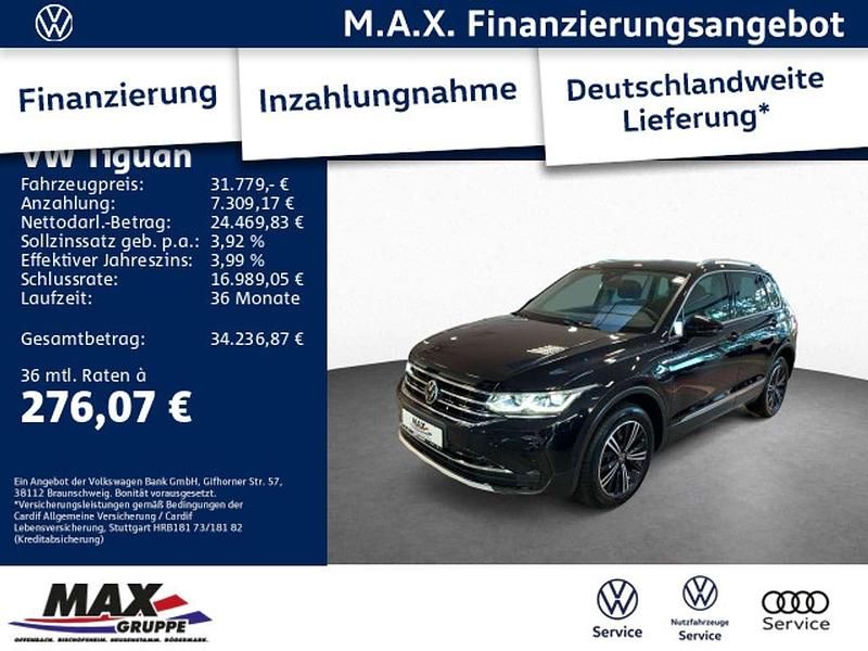 Deep black perleffekt (metallic) Gebraucht 2021 VW Tiguan Elegance SUV | 31.779 € (Fairer Preis) - Bild 1/3