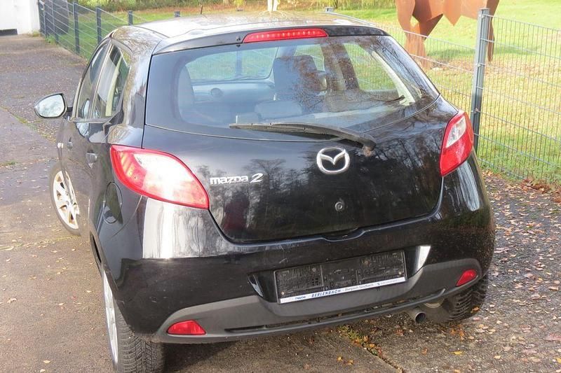 Gebraucht Mazda 2 Impuls 75 PS (55 kW) 2009 Schwarz Limousine