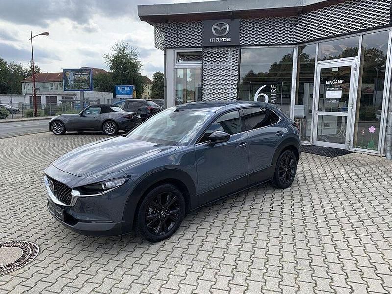 Grau Gebraucht 2022 Mazda CX-30 Homura-Line SUV | 21.560 € (Guter Preis) - Bild 1/4