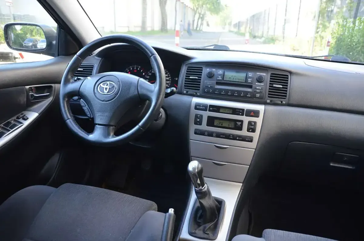 Gebraucht Toyota Corolla Sol 97 PS (71 kW) 2003 Black mica / ink Kombi
