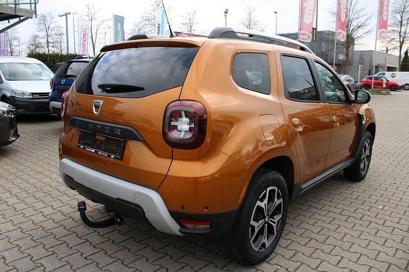 Używany Dacia Duster 116 KM (85 kW) 2021 Pomarańczowy SUV