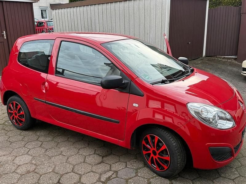 Second-hand Renault Twingo 58 CP (42 kW) 2011 Roșu Hatchback