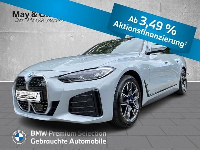 Grau Gebraucht 2024 BMW i4 Sport Line Limousine | 46.666 € (Guter Preis) - Bild 1/4