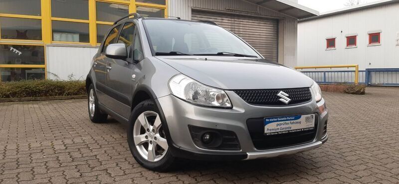 Grau Gebraucht 2011 Suzuki SX4 Comfort Kombi | 6.290 € (Etwas zu teuer) - Bild 1/4