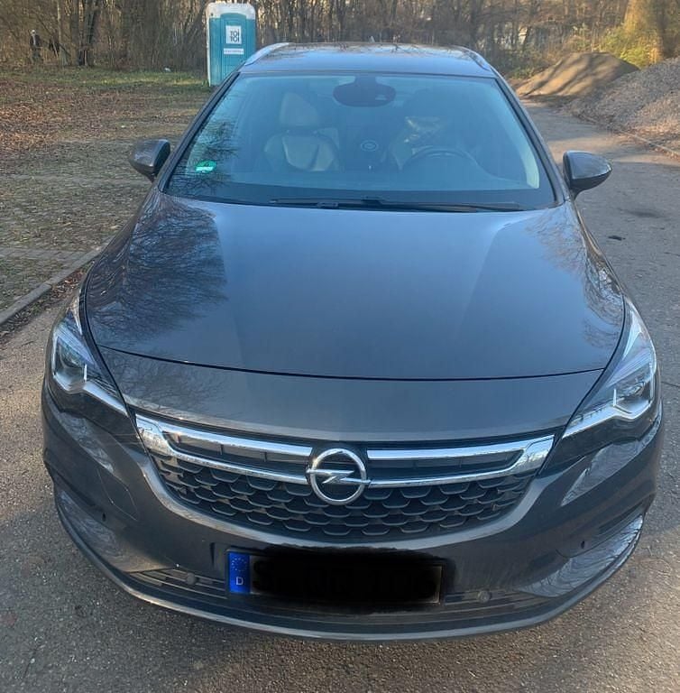 Grau Gebraucht 2016 Opel Astra S Kombi | 7.399 € (Etwas zu teuer) - Bild 1/4