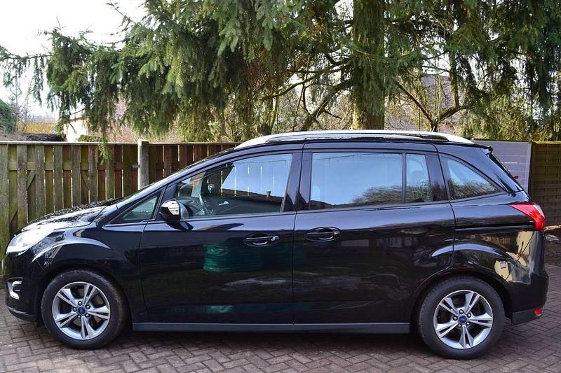 Gebraucht Ford Grand C-Max SYNC Edition 125 PS (91 kW) 2014 Pantherschwarz metallic Van / Kleinbus