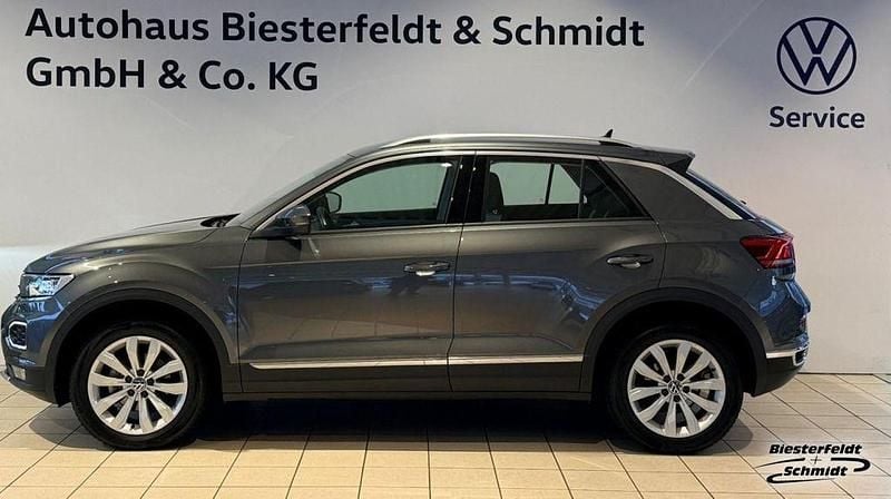 Indiumgrau (metallic) Gebraucht 2021 VW T-Roc Sport SUV | 25.990 € (Fairer Preis) - Bild 1/4