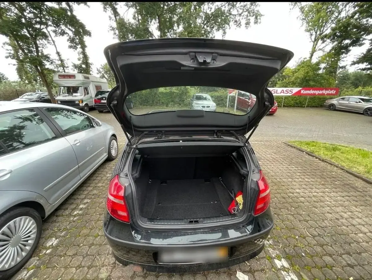 Brugt BMW 116 122 HK (89 kW) 2009 Sort Hatchback