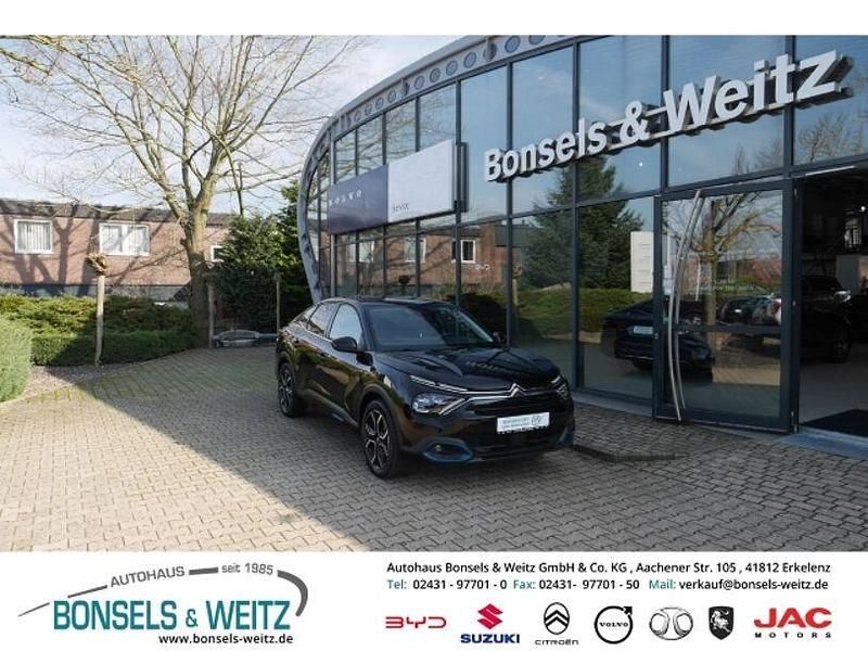 Gebraucht Citroën e-C4 Shine 100 kW (136 PS) 2023 Schwarz metallic Limousine