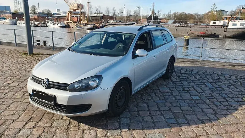 Second-hand VW Golf VII 105 CP (77 kW) 2013 Argintiu Break