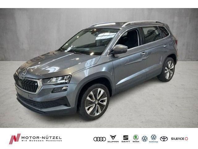 Graphitegrau metallic Gebraucht 2024 Skoda Karoq Selection SUV | 29.930 € (Guter Preis) - Bild 1/4