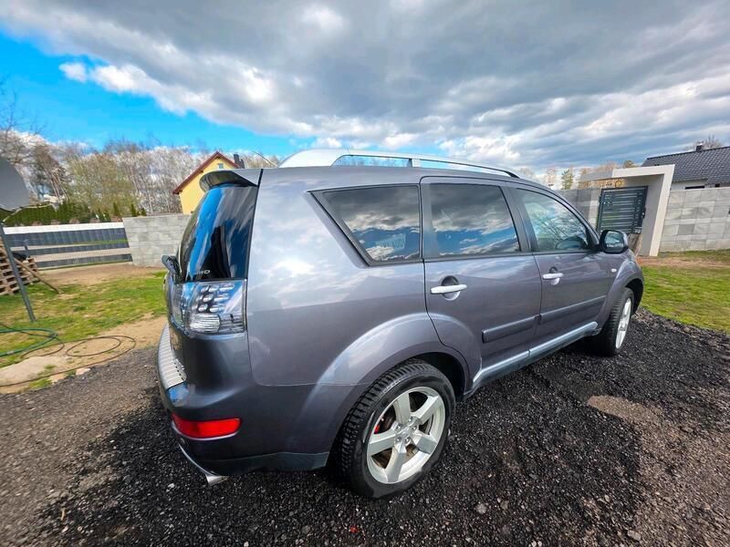 Grau Gebraucht 2009 Mitsubishi Outlander SUV | 5.600 € - Bild 1/4