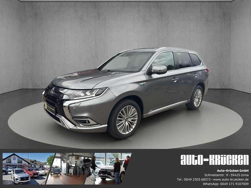 Platinumgrau Gebraucht 2021 Mitsubishi Outlander P-HEV Top SUV | 25.990 € (Etwas zu teuer) - Bild 1/4