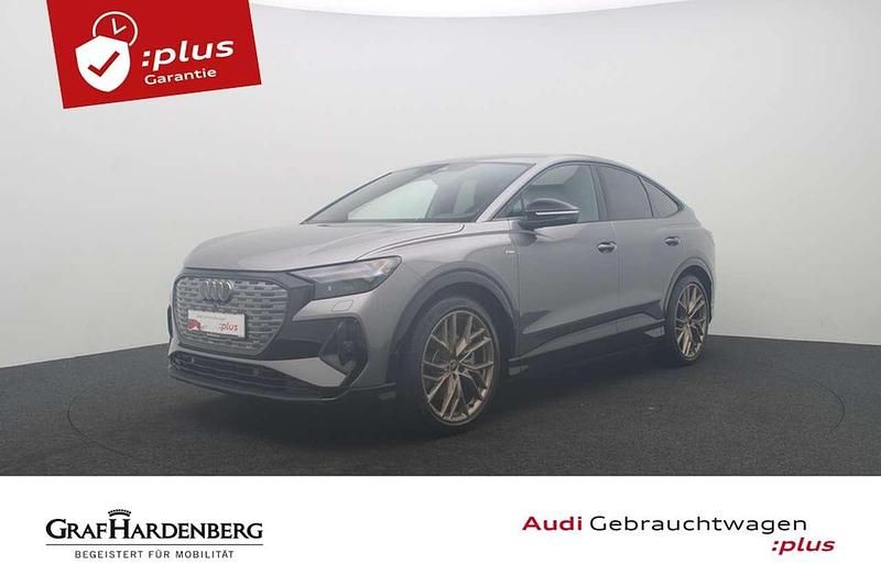 Grau Gebraucht 2022 Audi Q4 Sportback e-tron S-Line SUV | 37.380 € (Etwas zu teuer) - Bild 1/4