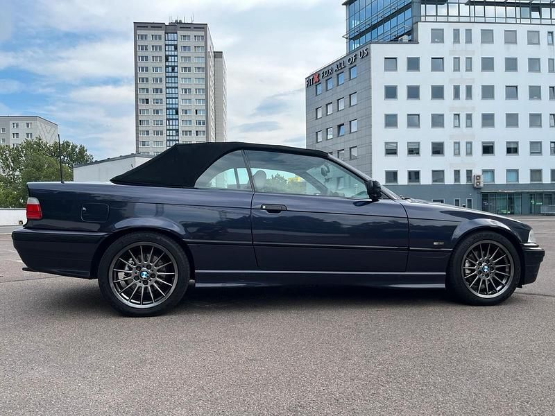 Gebraucht BMW 320 Cabriolet 150 PS (110 kW) 1997 Violet Cabrio