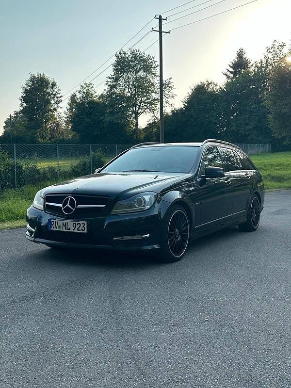 Schwarz Gebraucht 2011 Mercedes C250 AMG line Kombi | 5.499 € (Superpreis) - Bild 1/4