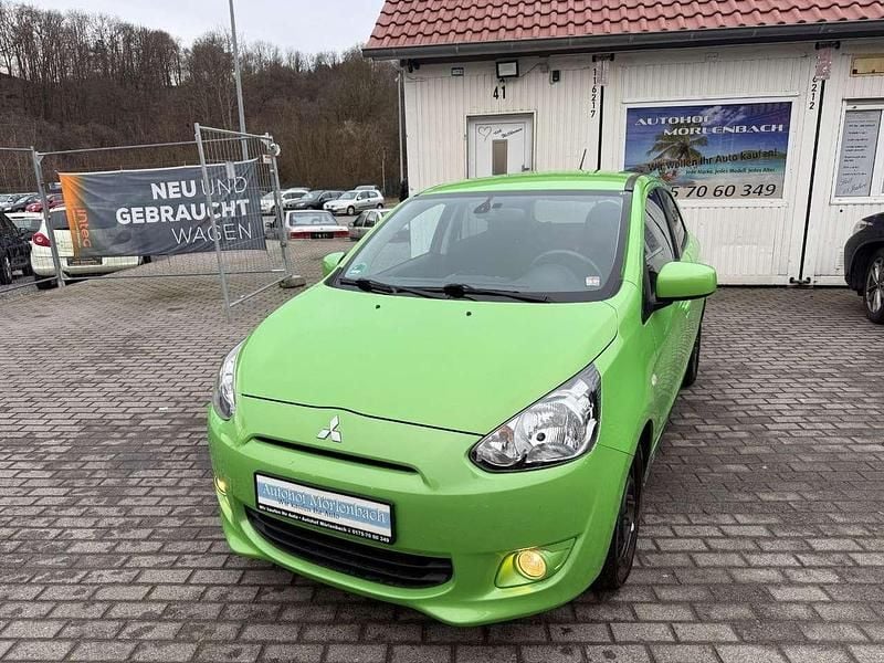 Grün Gebraucht 2015 Mitsubishi Space Star Diamant Edition Kleinwagen | 6.950 € (Fairer Preis) - Bild 1/4
