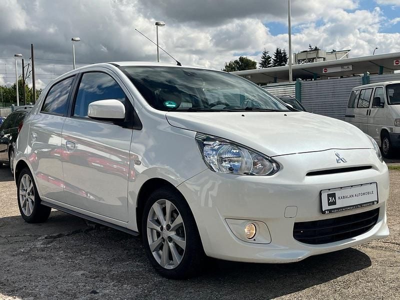 Weiß Gebraucht 2014 Mitsubishi Space Star Kleinwagen | 3.990 € (Guter Preis) - Bild 1/4