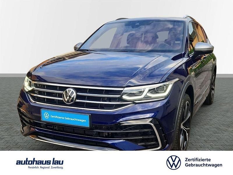 Atlantikbluemetallic Gebraucht 2024 VW Tiguan Allspace R-line SUV | 39.950 € (Superpreis) - Bild 1/4