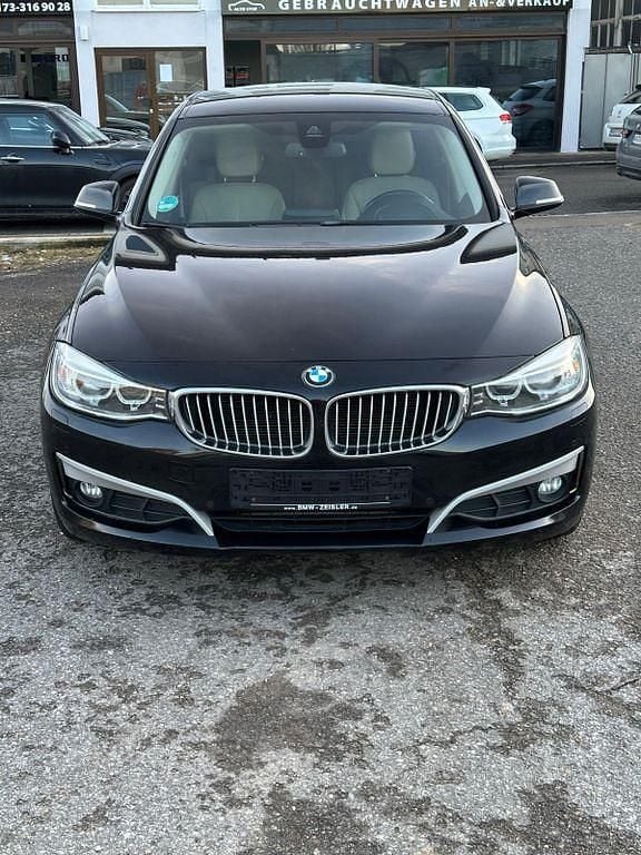 Schwarz Gebraucht 2014 BMW 318 Gran Turismo Sport Line Limousine | 7.900 € (Superpreis) - Bild 1/4