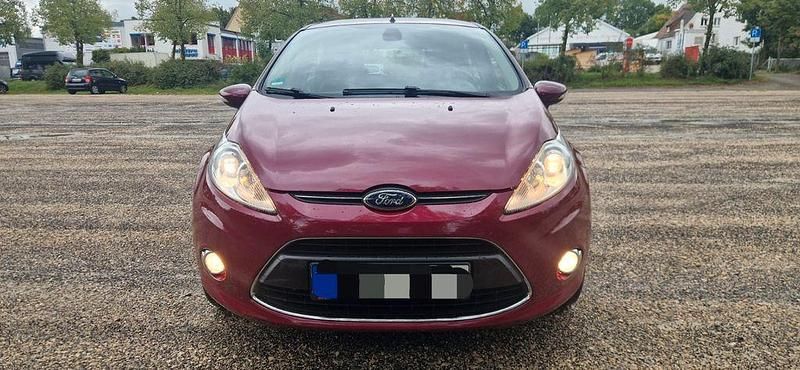 Rot Gebraucht 2012 Ford Fiesta Titanium Kleinwagen | 4.900 € (Fairer Preis) - Bild 1/4
