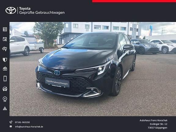Mysticschwarz mica Gebraucht 2023 Toyota Corolla Team | 23.890 € (Guter Preis) - Bild 1/4