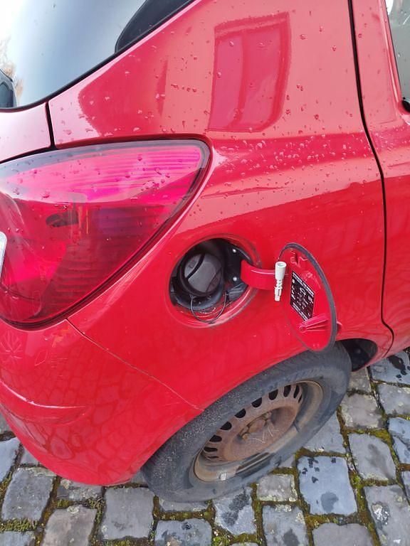 Gebraucht Opel Corsa 60 PS (44 kW) 2009 Rot Kleinwagen