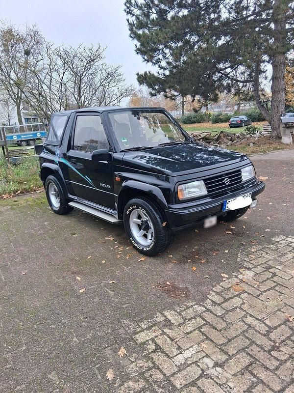 Gebraucht Suzuki Vitara 86 PS (63 kW) 1994 Schwarz Cabrio