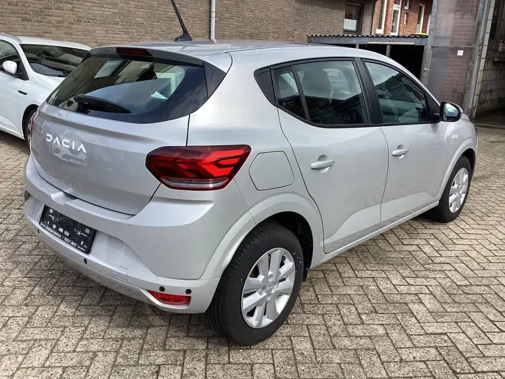 Gebraucht Dacia Sandero Expression 91 PS (66 kW) 2023 Moonstonegrau Kleinwagen