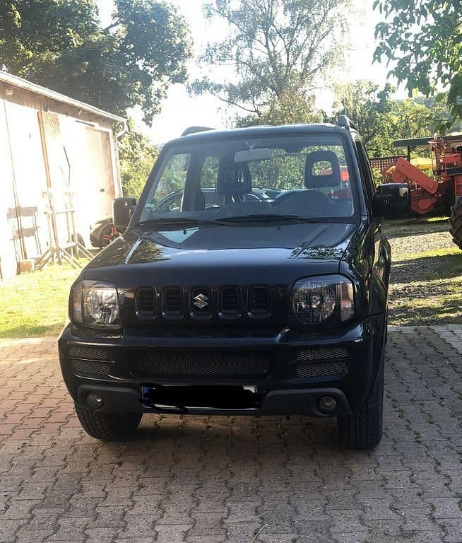 Schwarz Gebraucht 2012 Suzuki Jimny Comfort SUV | 16.000 € (Etwas zu teuer) - Bild 1/4