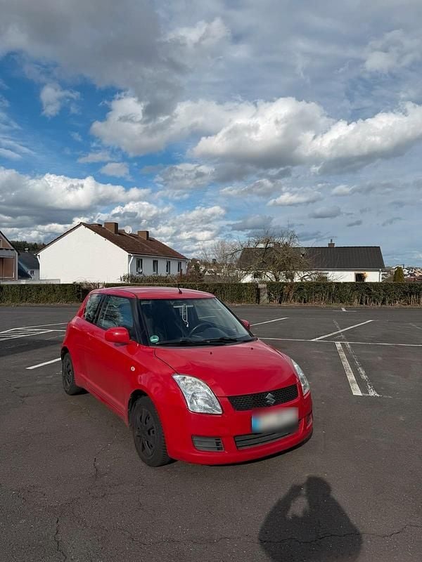 Second-hand Suzuki Swift 92 CP (67 kW) 2009 Roșu Hatchback