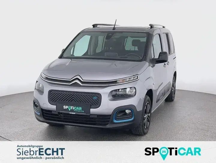Grau Gebraucht 2022 Citroën e-Berlingo Shine Van / Kleinbus | 24.470 € (Fairer Preis) - Bild 1/4