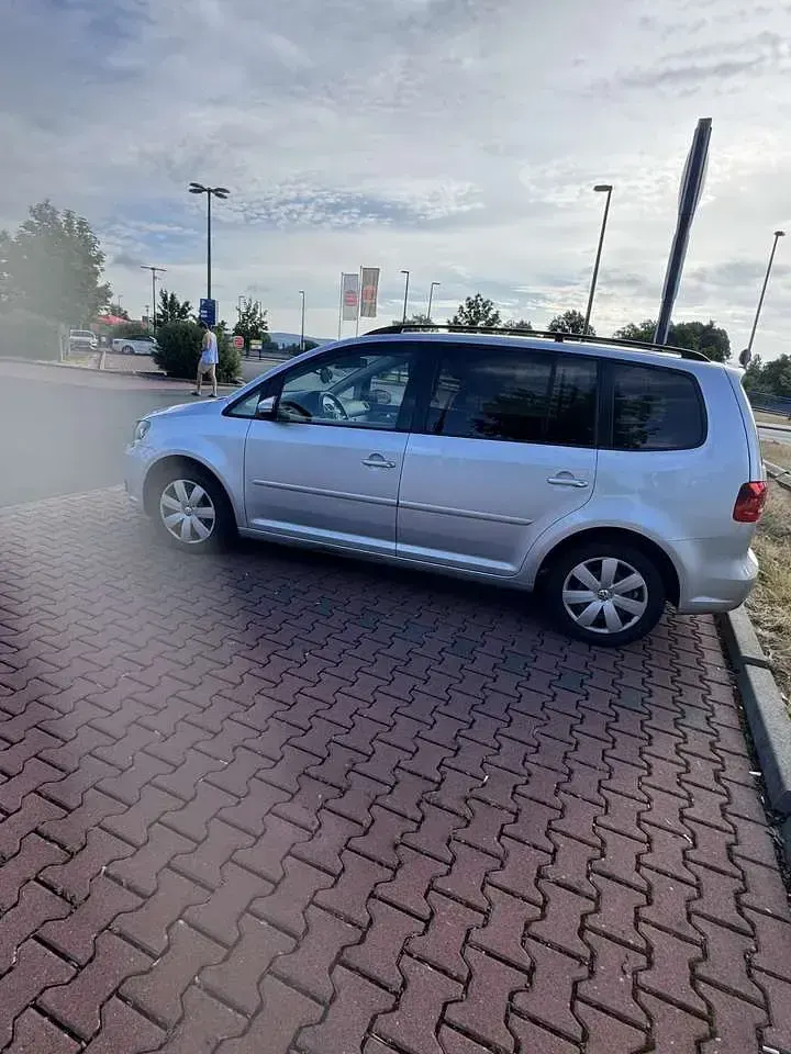 Gebraucht VW Touran Comfortline 140 PS (102 kW) 2012 Grau Van / Kleinbus