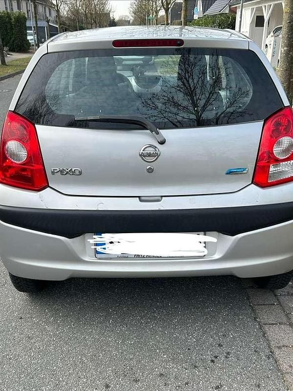 Gebraucht Nissan Pixo Visia 68 PS (50 kW) 2012 Silber Kleinwagen